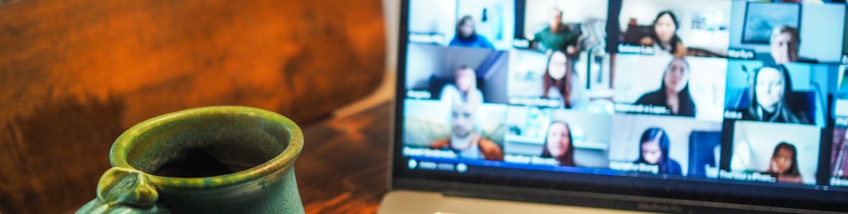 macbook pro displaying group of people